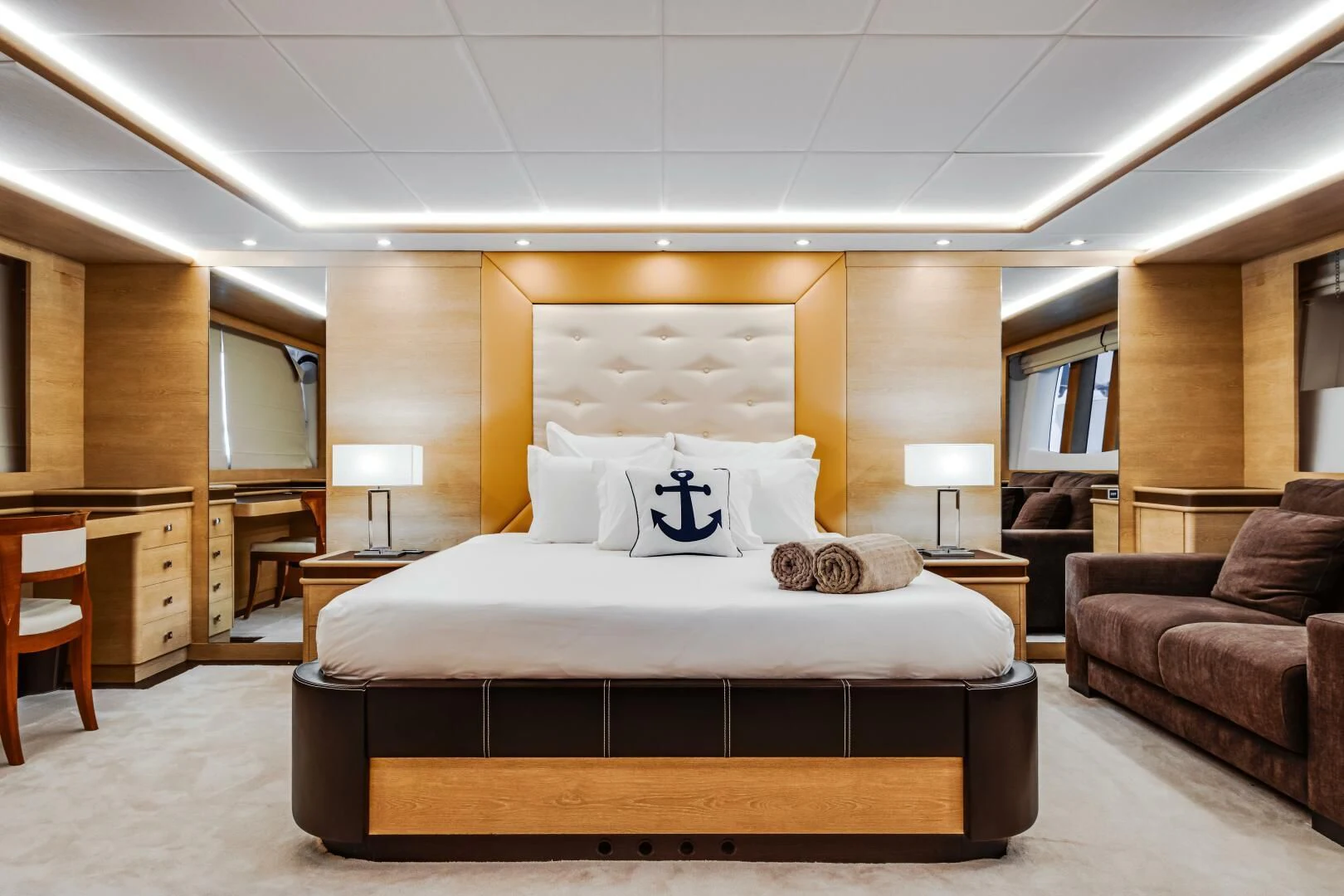 a large bed in a hotel room aboard GRACE Yacht for Sale