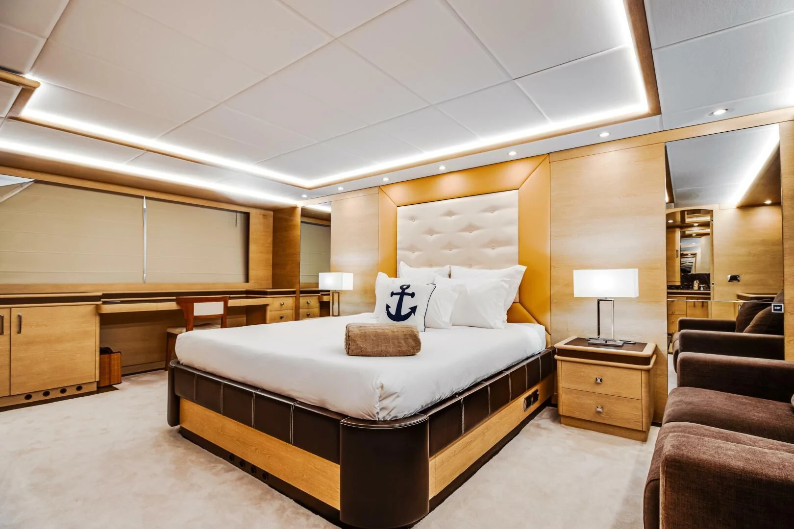 a large bed in a hotel room aboard GRACE Yacht for Sale