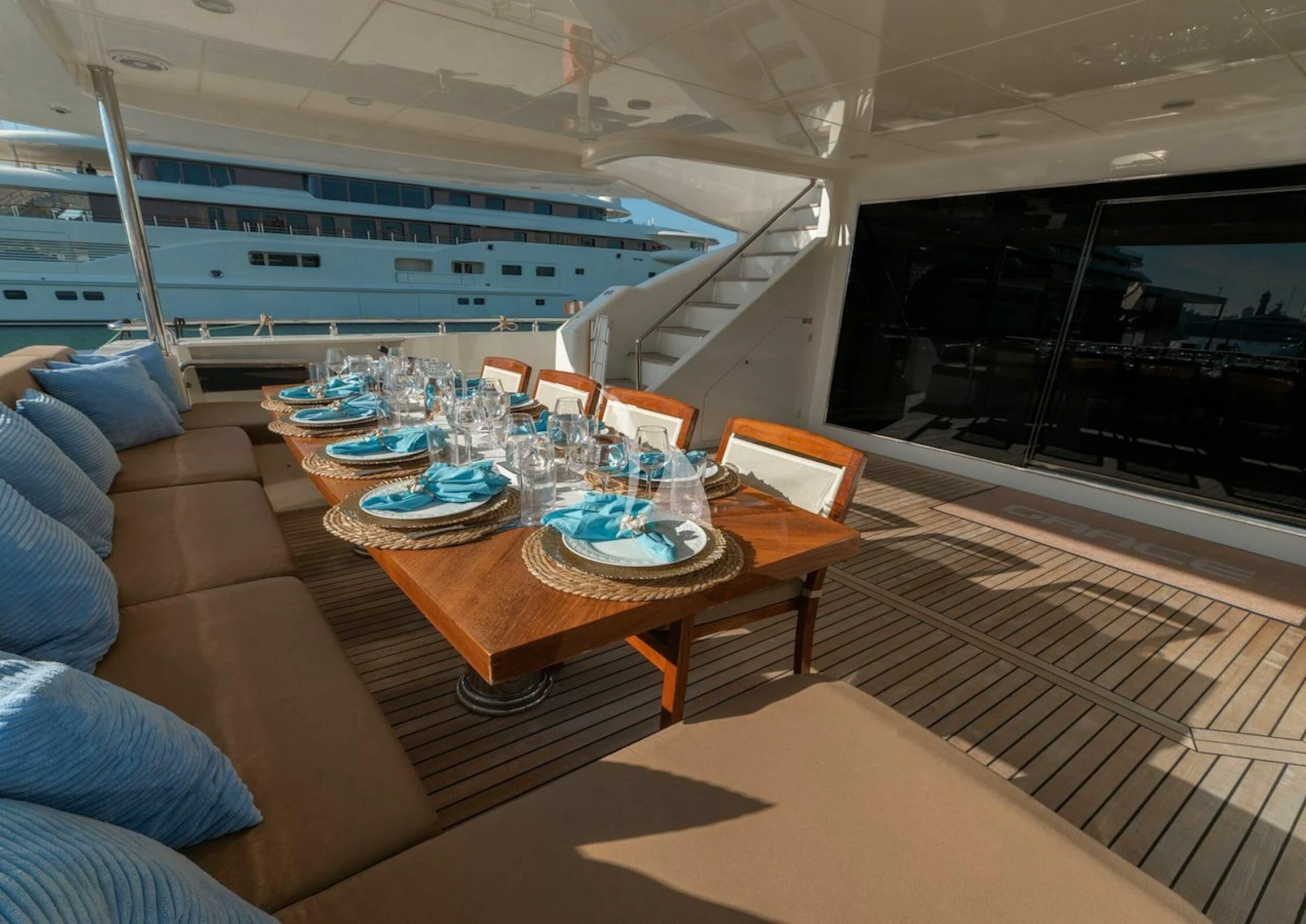 a dining room with a table and chairs aboard GRACE Yacht for Sale