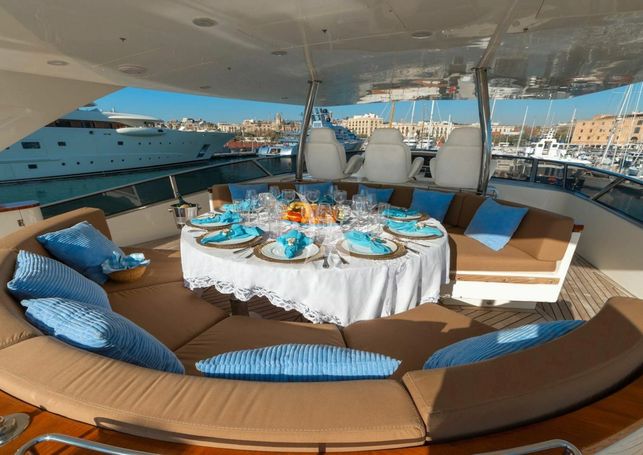 a table with plates and food on it aboard GRACE Yacht for Sale