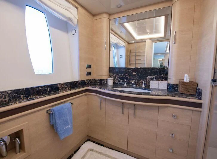a kitchen with a sink and a window aboard GRACE Yacht for Sale
