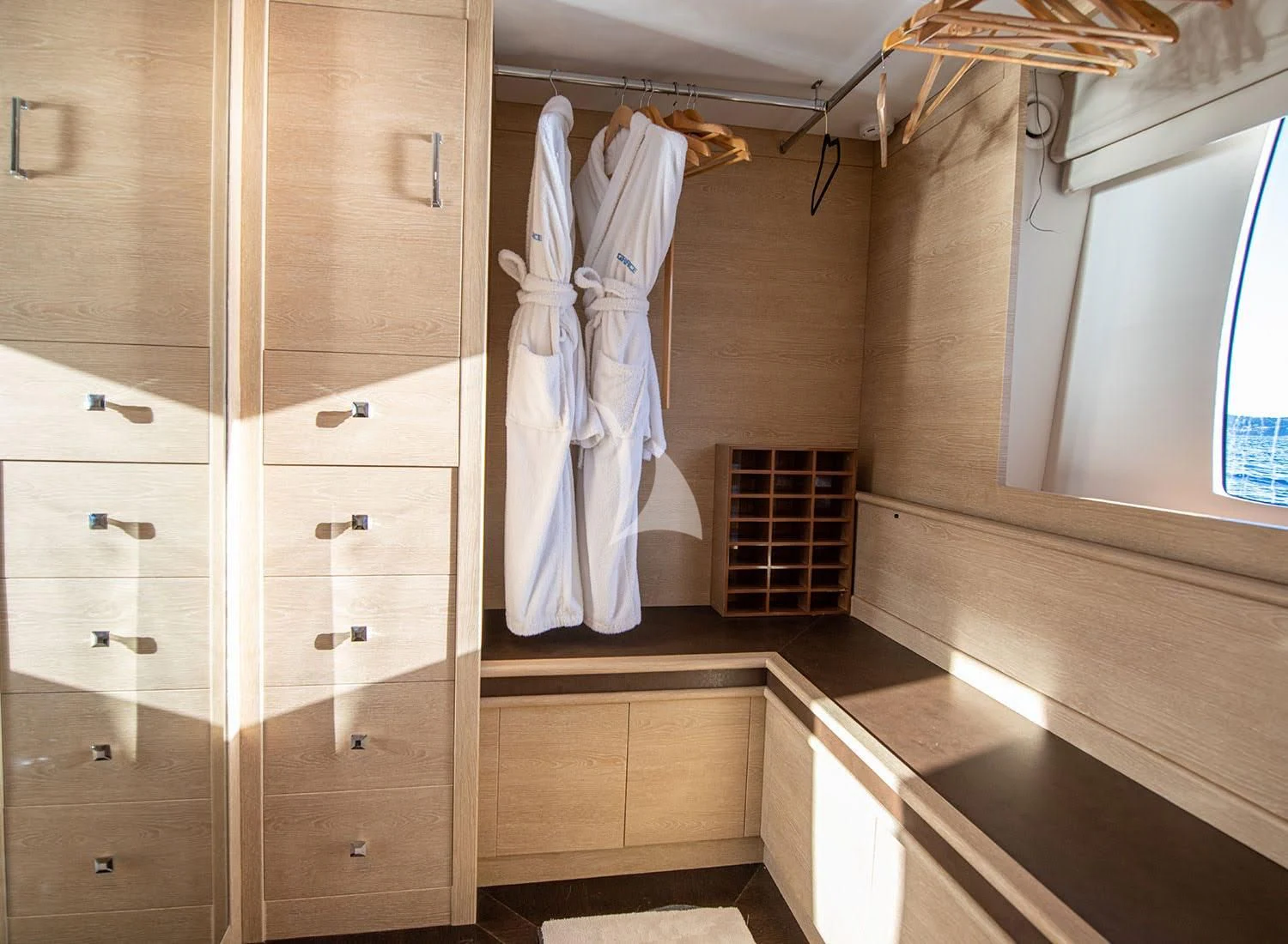a room with a closet and a bed aboard GRACE Yacht for Sale