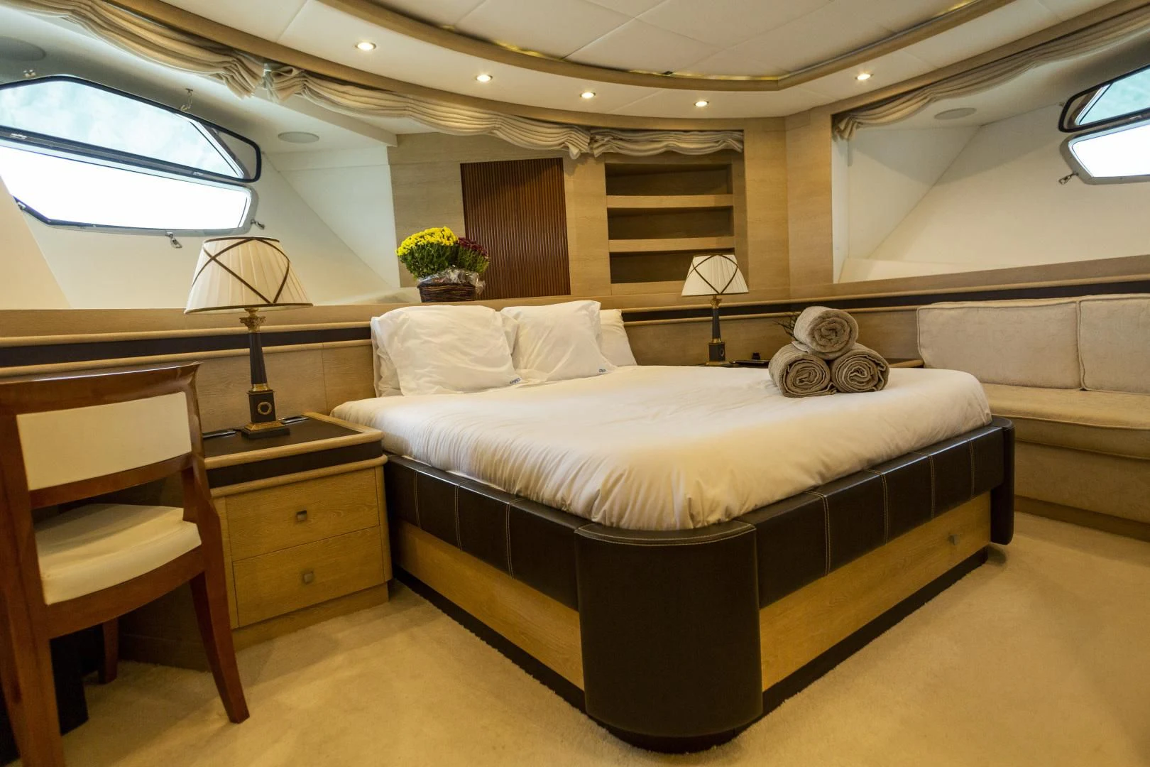 a large bed in a room aboard GRACE Yacht for Sale