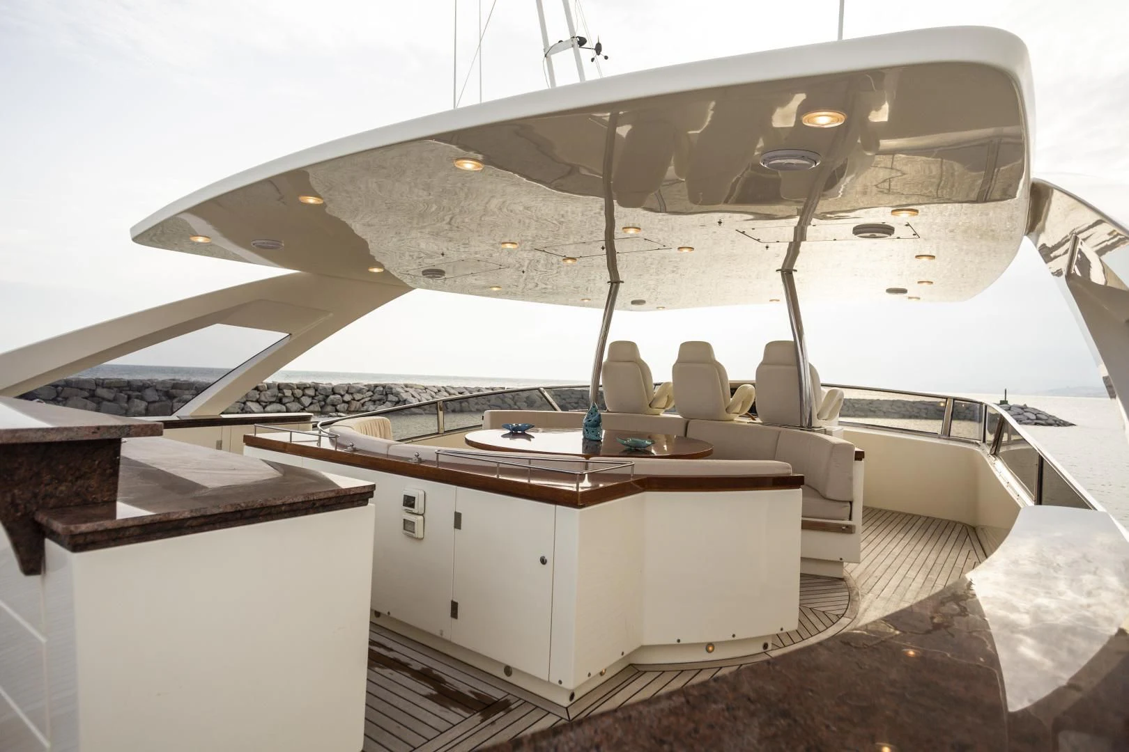 a boat with a desk and chairs aboard GRACE Yacht for Sale
