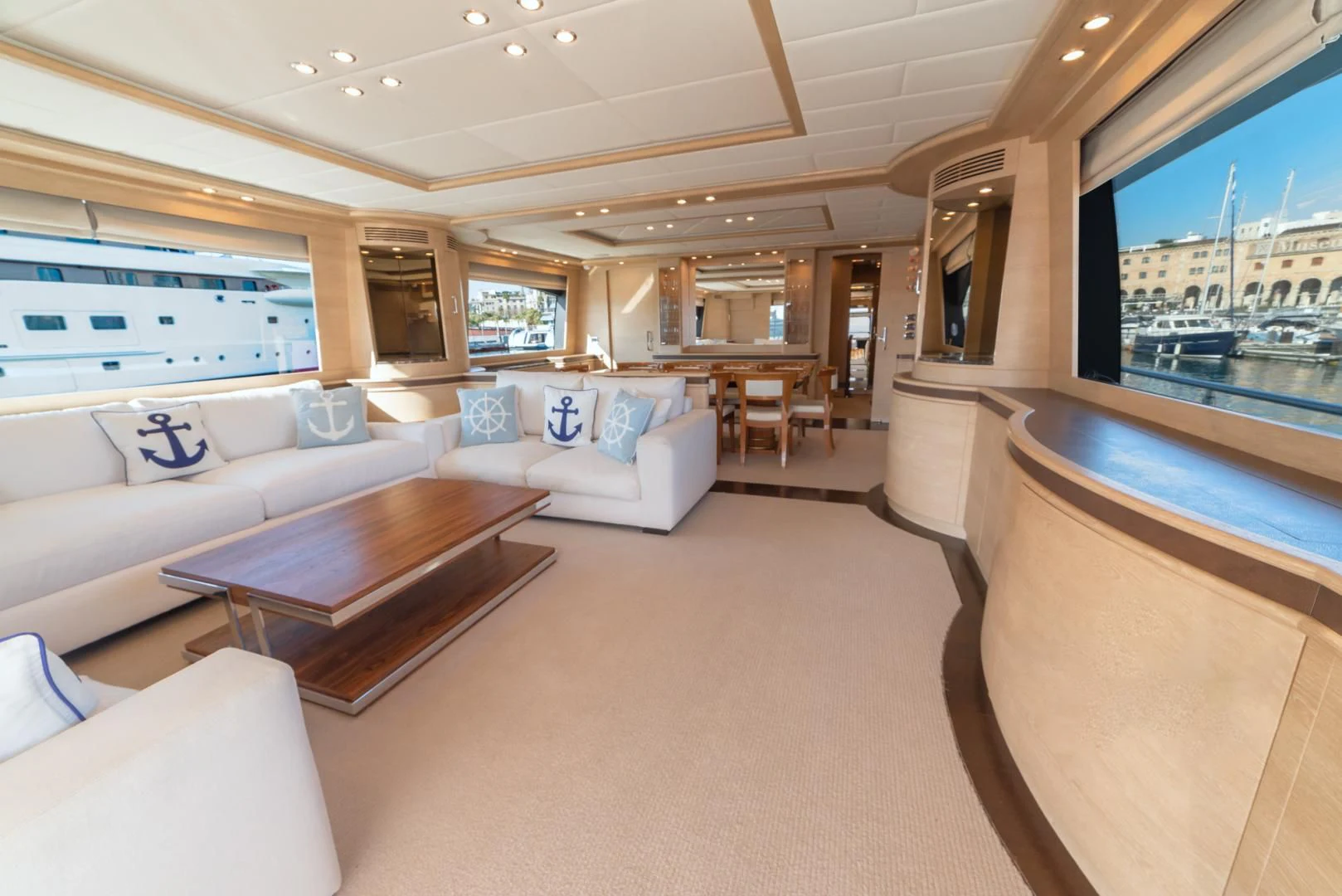 a living room with a large screen aboard GRACE Yacht for Sale