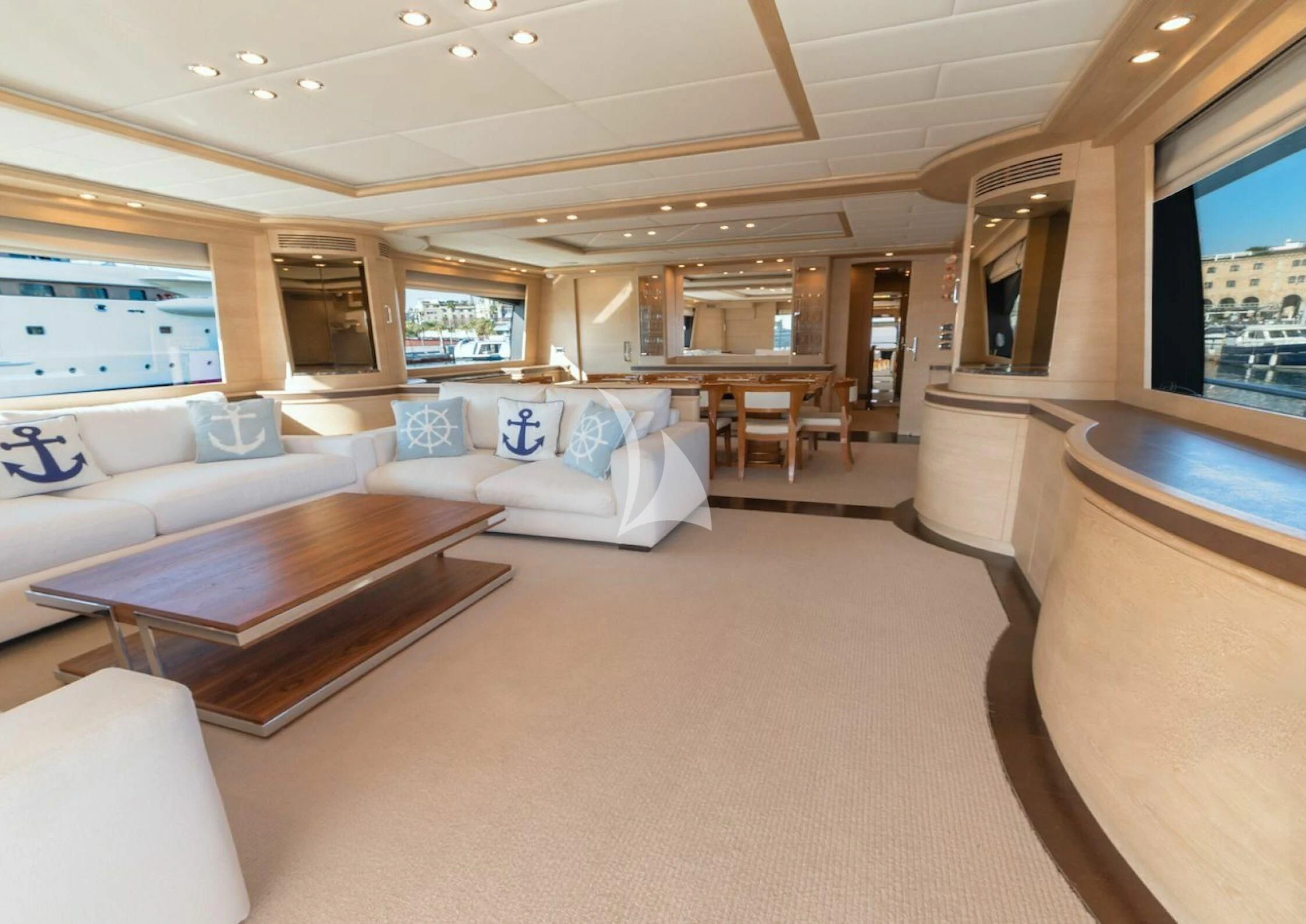 a large living room with a large window aboard GRACE Yacht for Sale