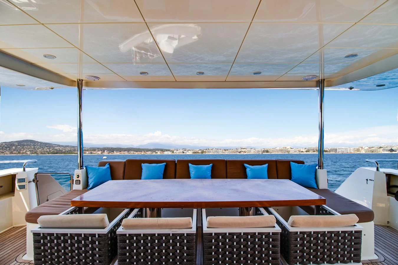 a boat with chairs and tables aboard GRACE Yacht for Sale