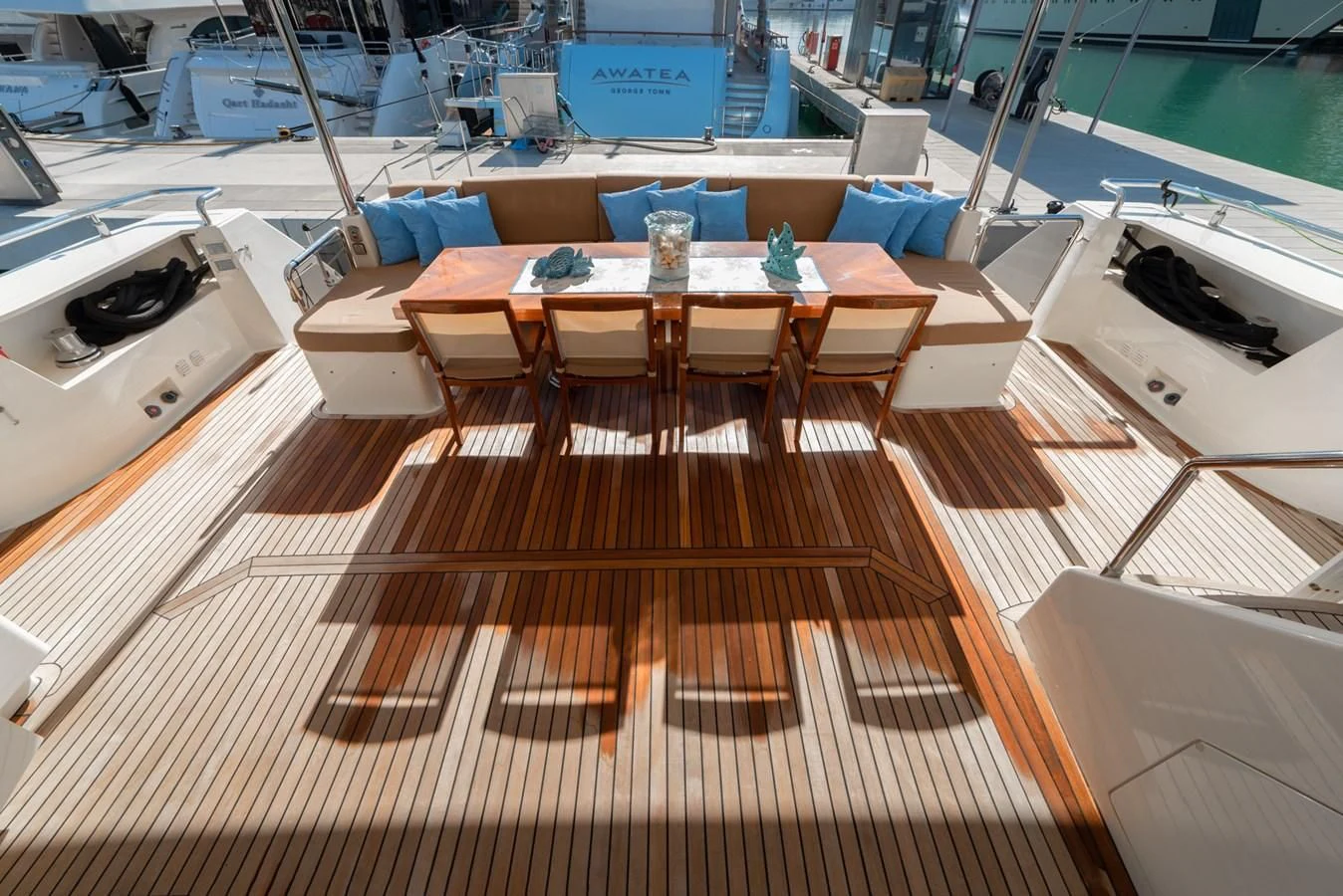 a wooden table on a boat aboard GRACE Yacht for Sale