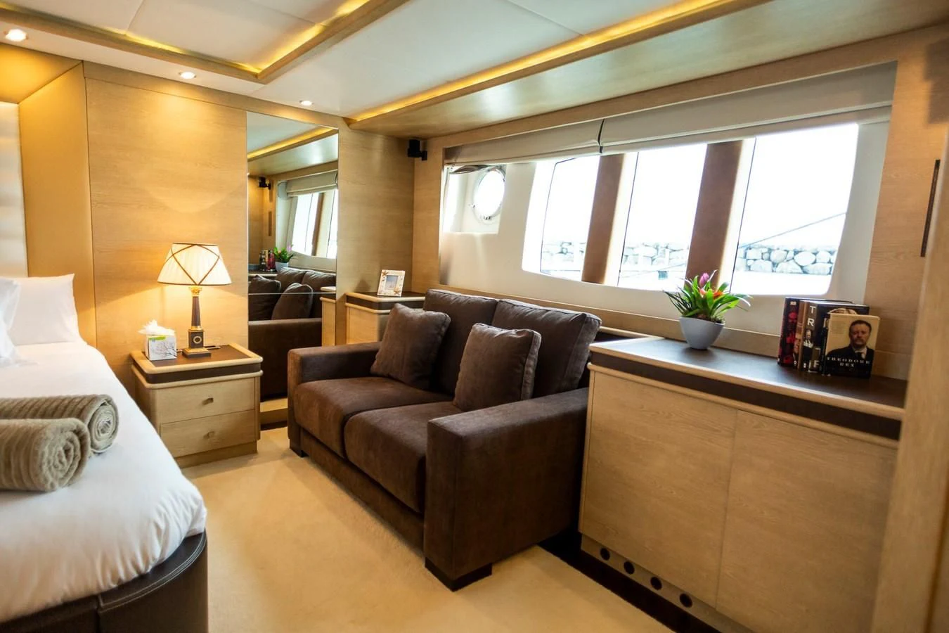 a room with a couch and a chair aboard GRACE Yacht for Sale