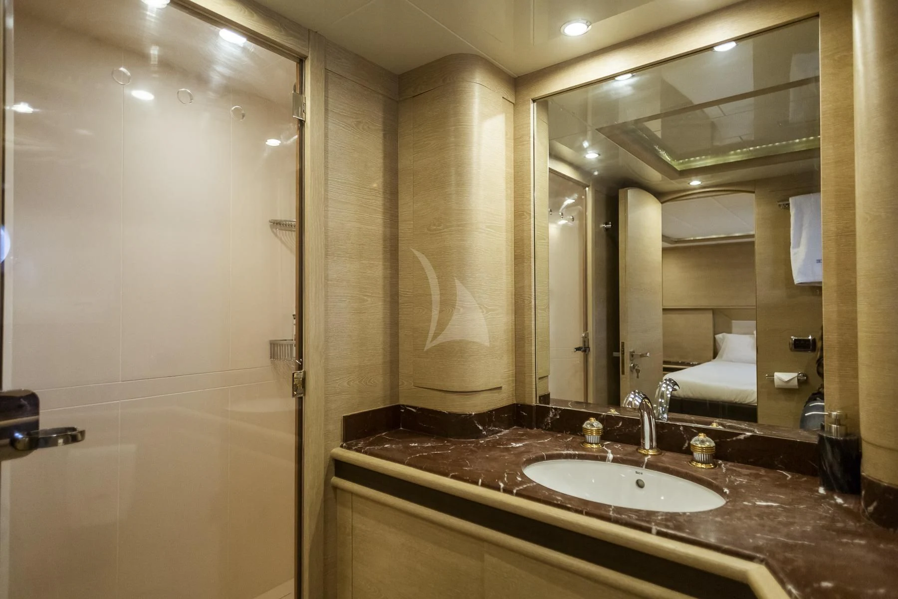 a bathroom with a large mirror aboard GRACE Yacht for Sale