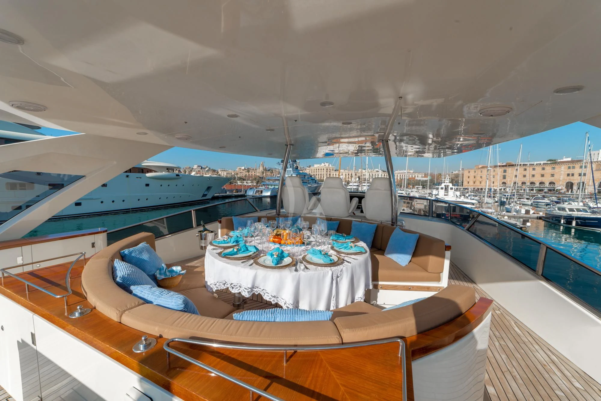 a room with a table and chairs aboard GRACE Yacht for Sale