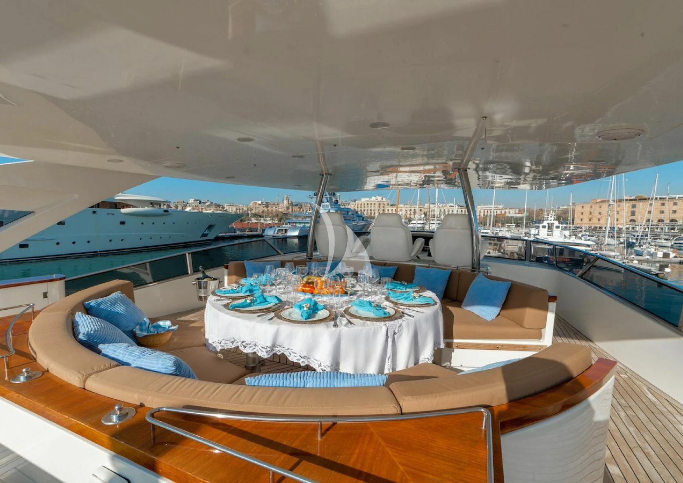 a room with a table and chairs aboard GRACE Yacht for Sale