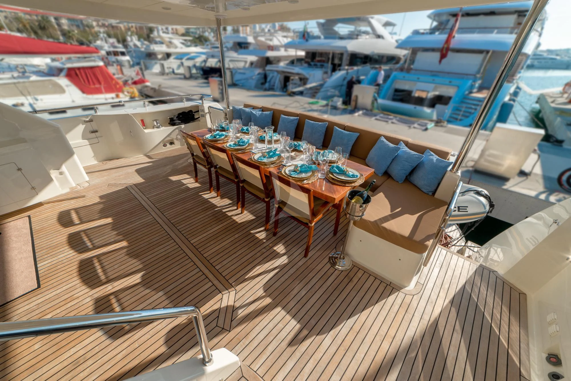 a boat with tables and chairs aboard GRACE Yacht for Sale