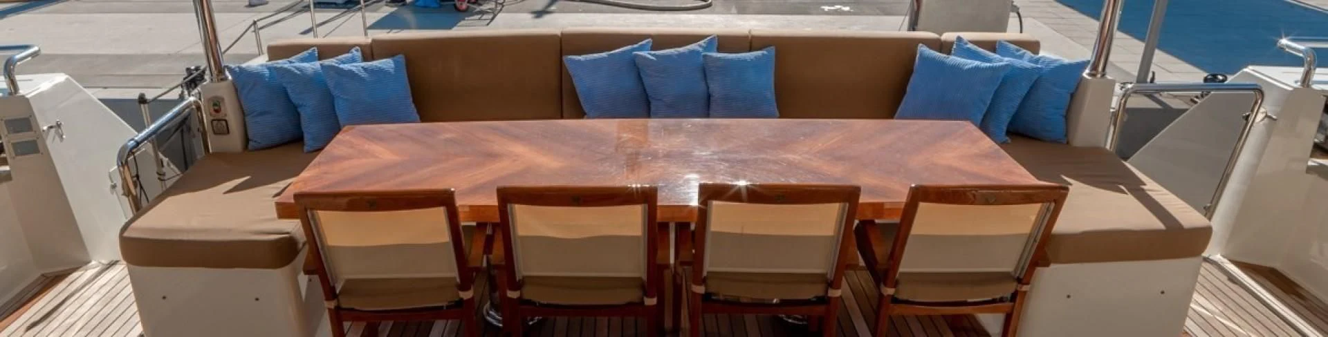 a table with chairs around it aboard GRACE Yacht for Sale