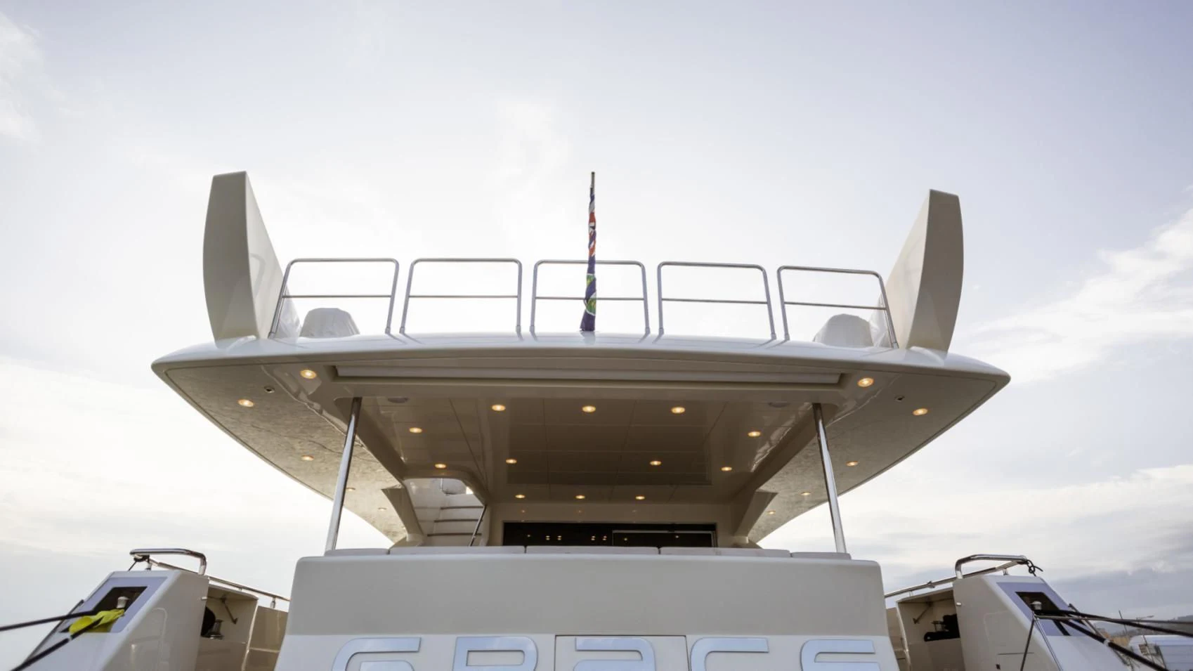 a large white boat aboard GRACE Yacht for Sale