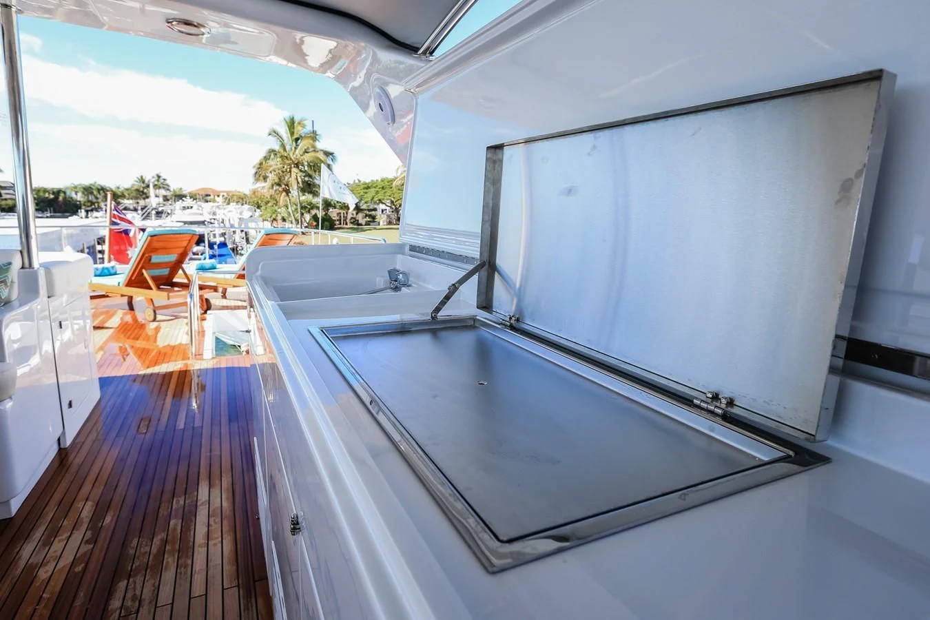a large white rectangular object on a wooden surface aboard HUNTER Yacht for Sale