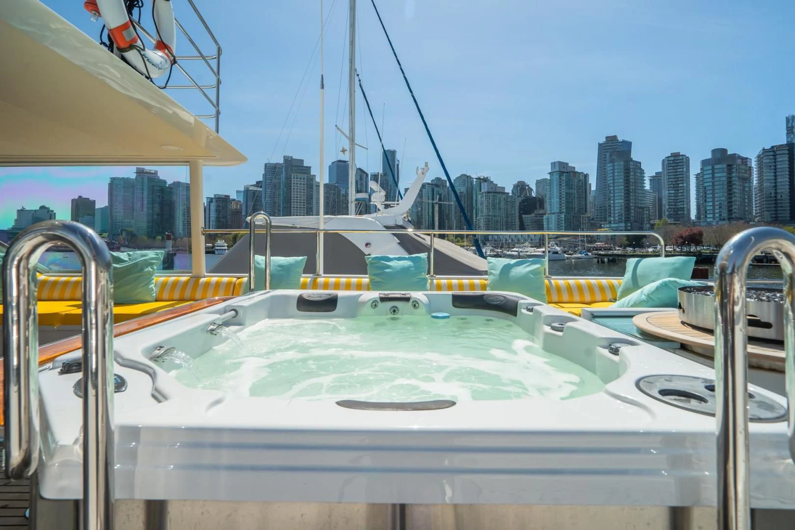 a boat with a city in the background aboard SOVEREIGN LADY Yacht for Sale