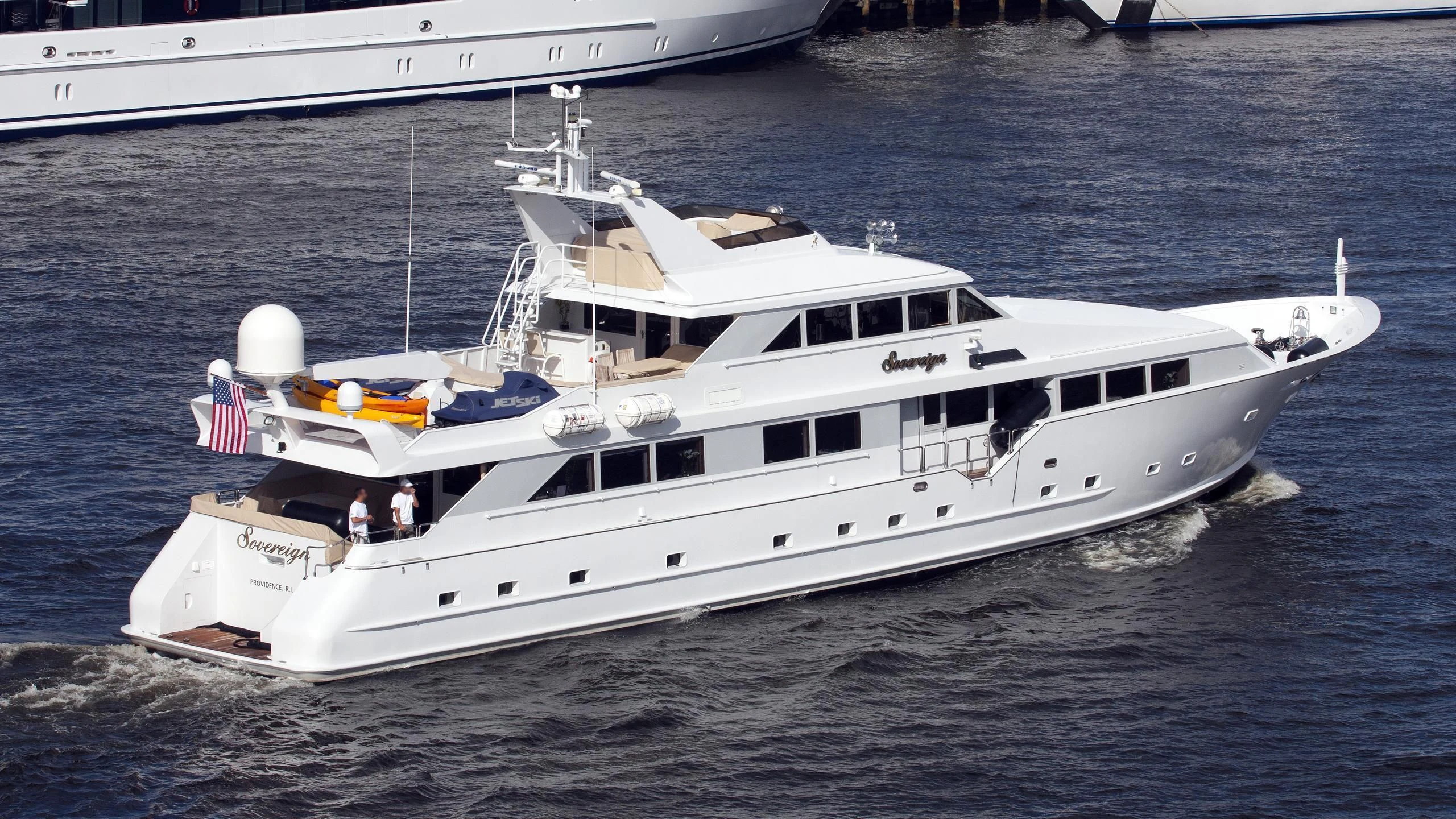a white yacht on the water aboard SOVEREIGN LADY Yacht for Sale