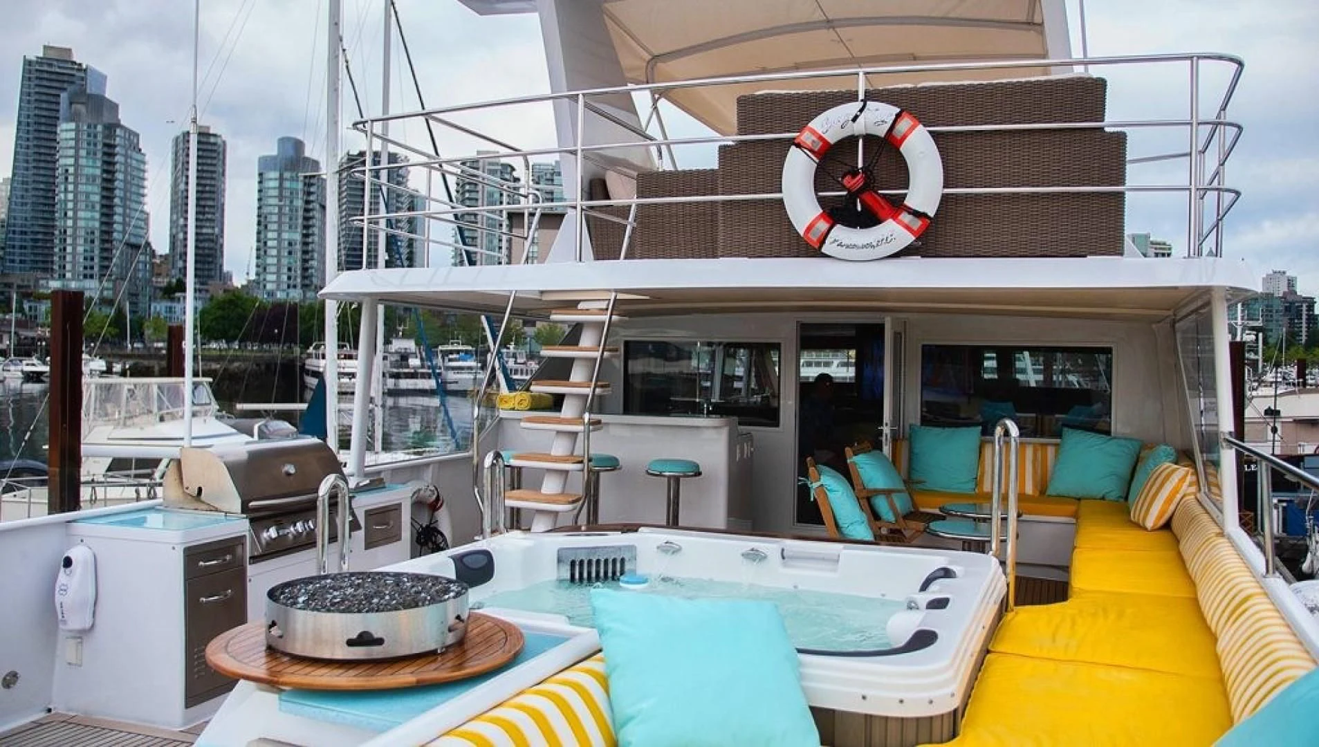 a room with a table and chairs aboard SOVEREIGN LADY Yacht for Sale