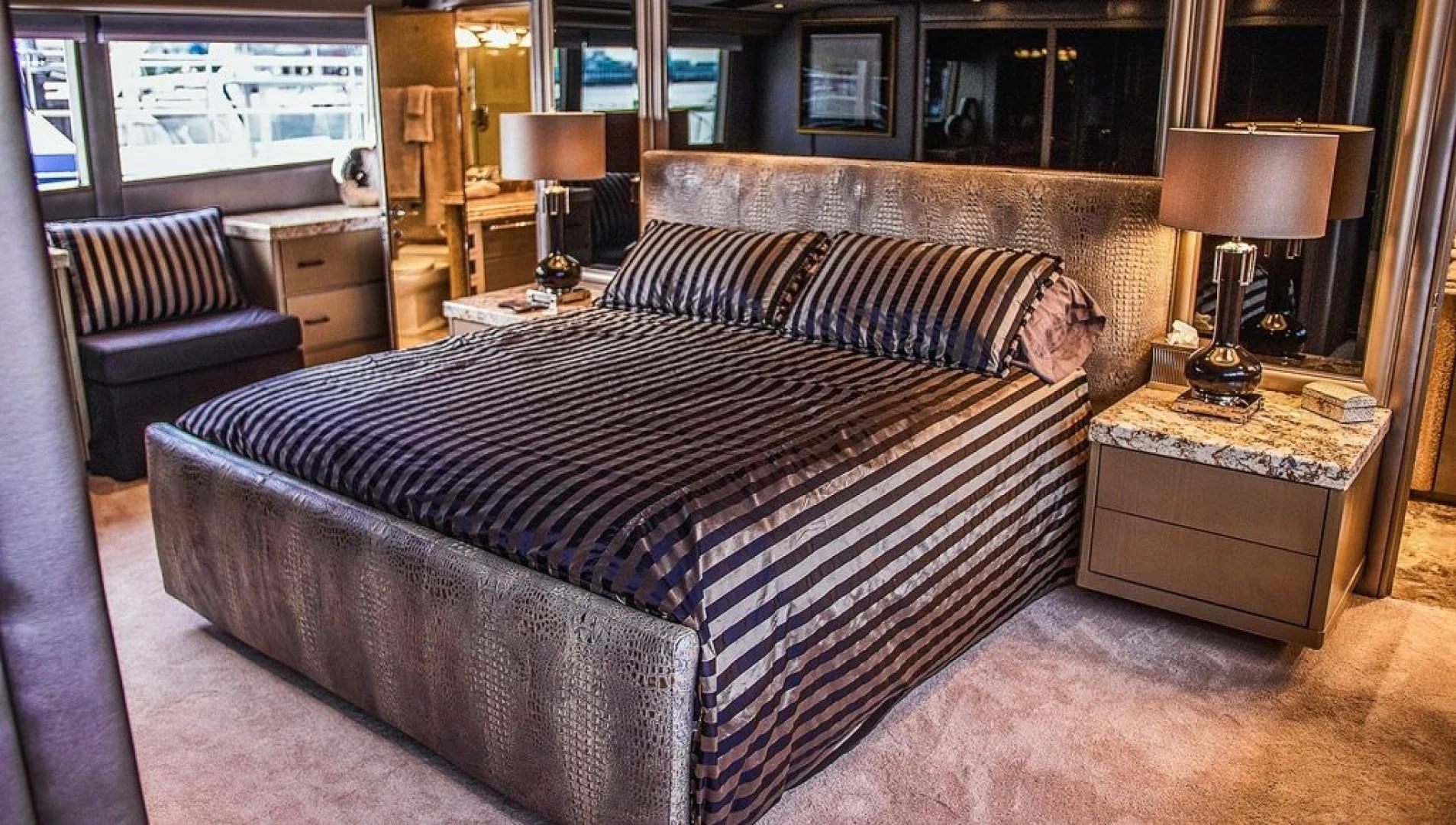 a bed in a room aboard SOVEREIGN LADY Yacht for Sale