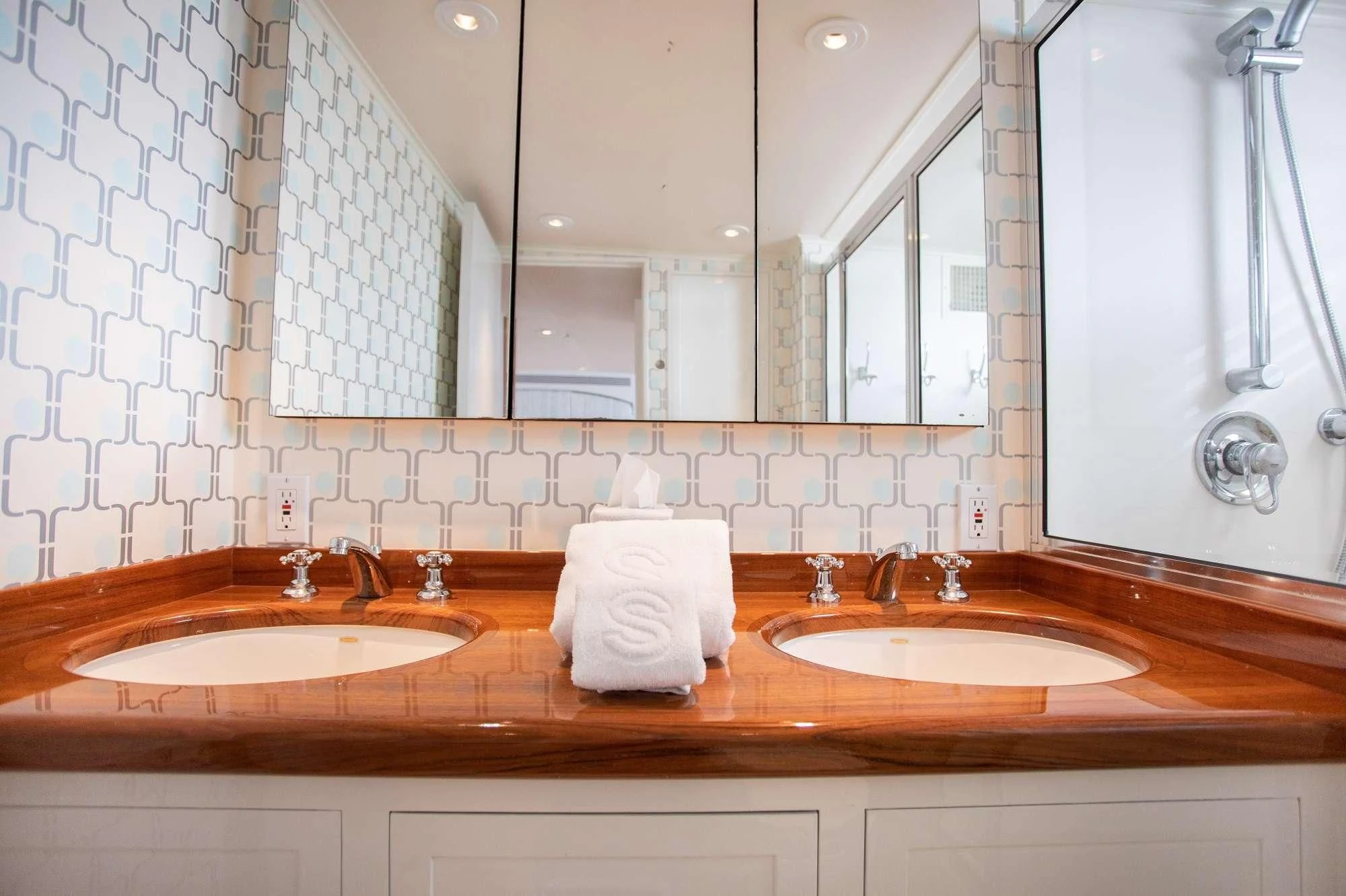 a bathroom with two sinks aboard SOVEREIGN Yacht for Charter