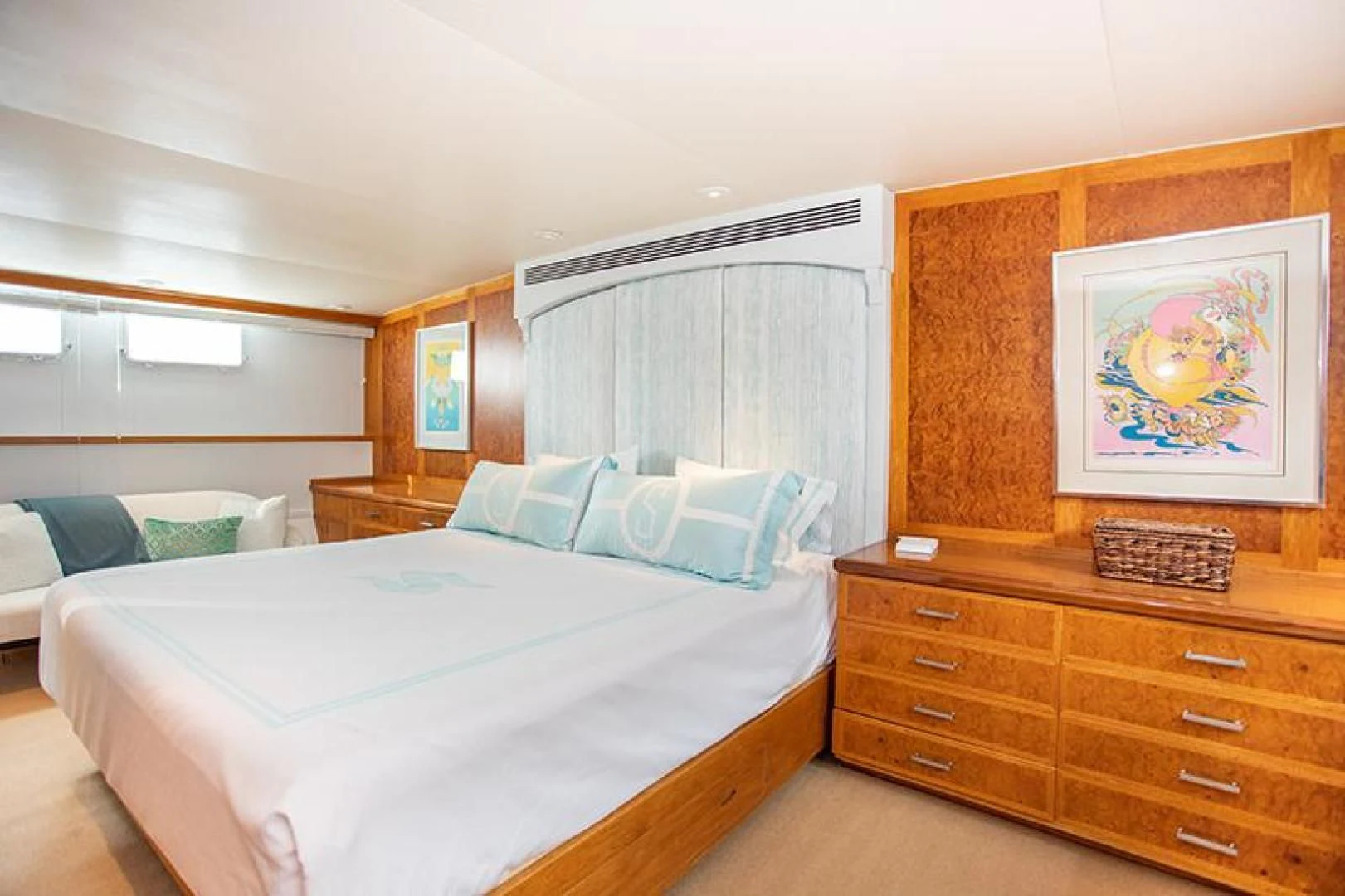 a bedroom with two beds aboard SOVEREIGN Yacht for Charter