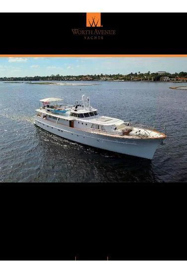 a large white ship in the water aboard SOVEREIGN Yacht for Charter