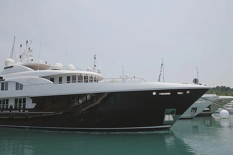 a large white boat in the water aboard BACA Yacht for Charter