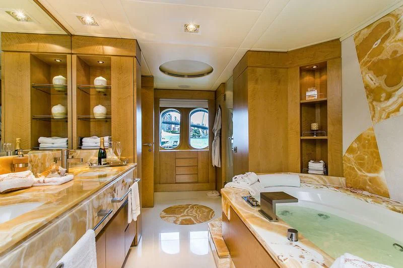 a bathroom with a large tub aboard BACA Yacht for Charter