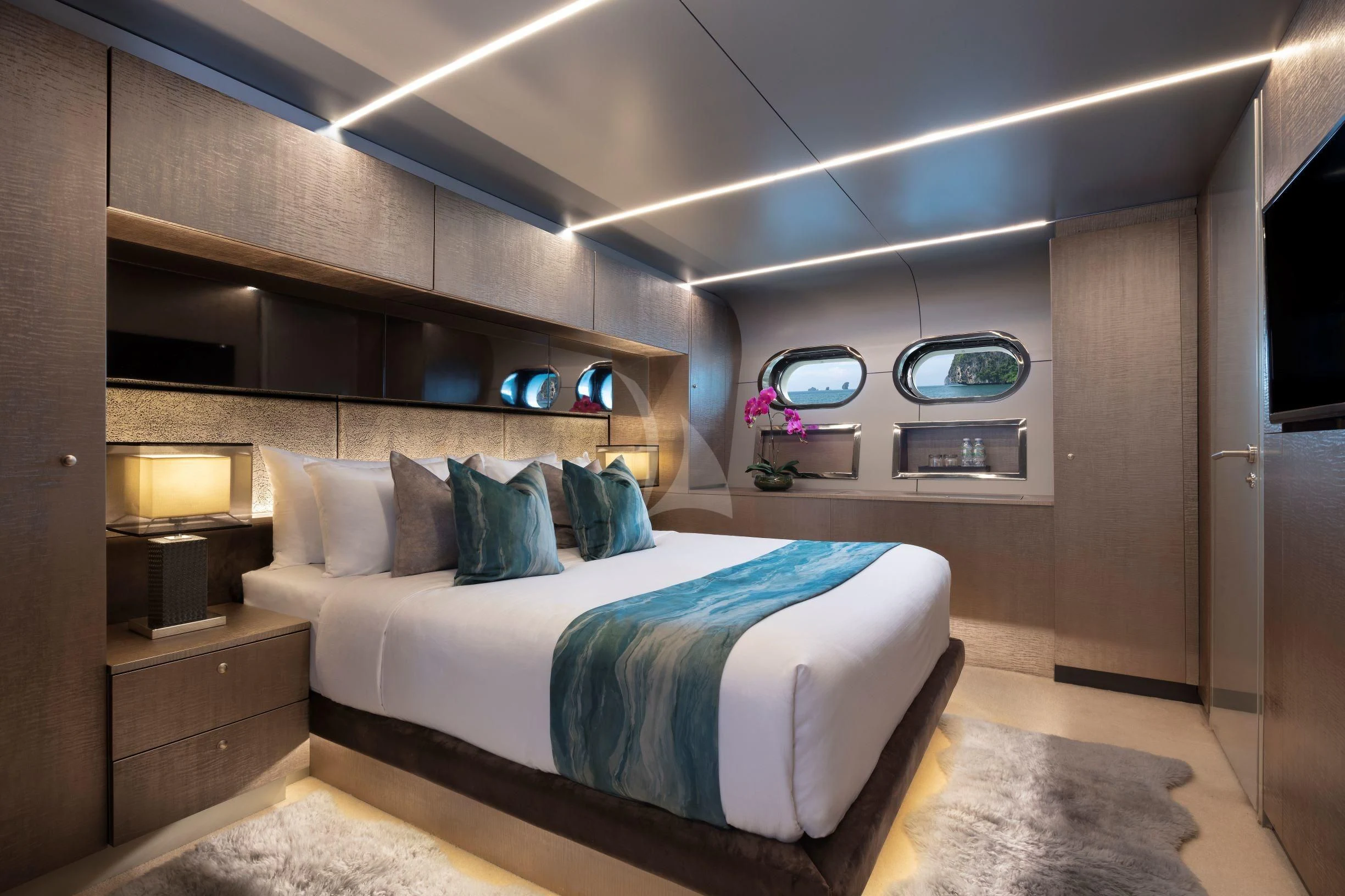 a bedroom with a bed aboard OCEAN EMERALD Yacht for Sale