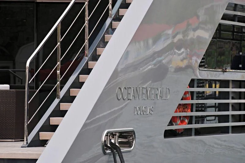 a white banner with a red light aboard OCEAN EMERALD Yacht for Sale