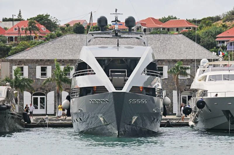a boat docked at a pier aboard OCEAN EMERALD Yacht for Sale