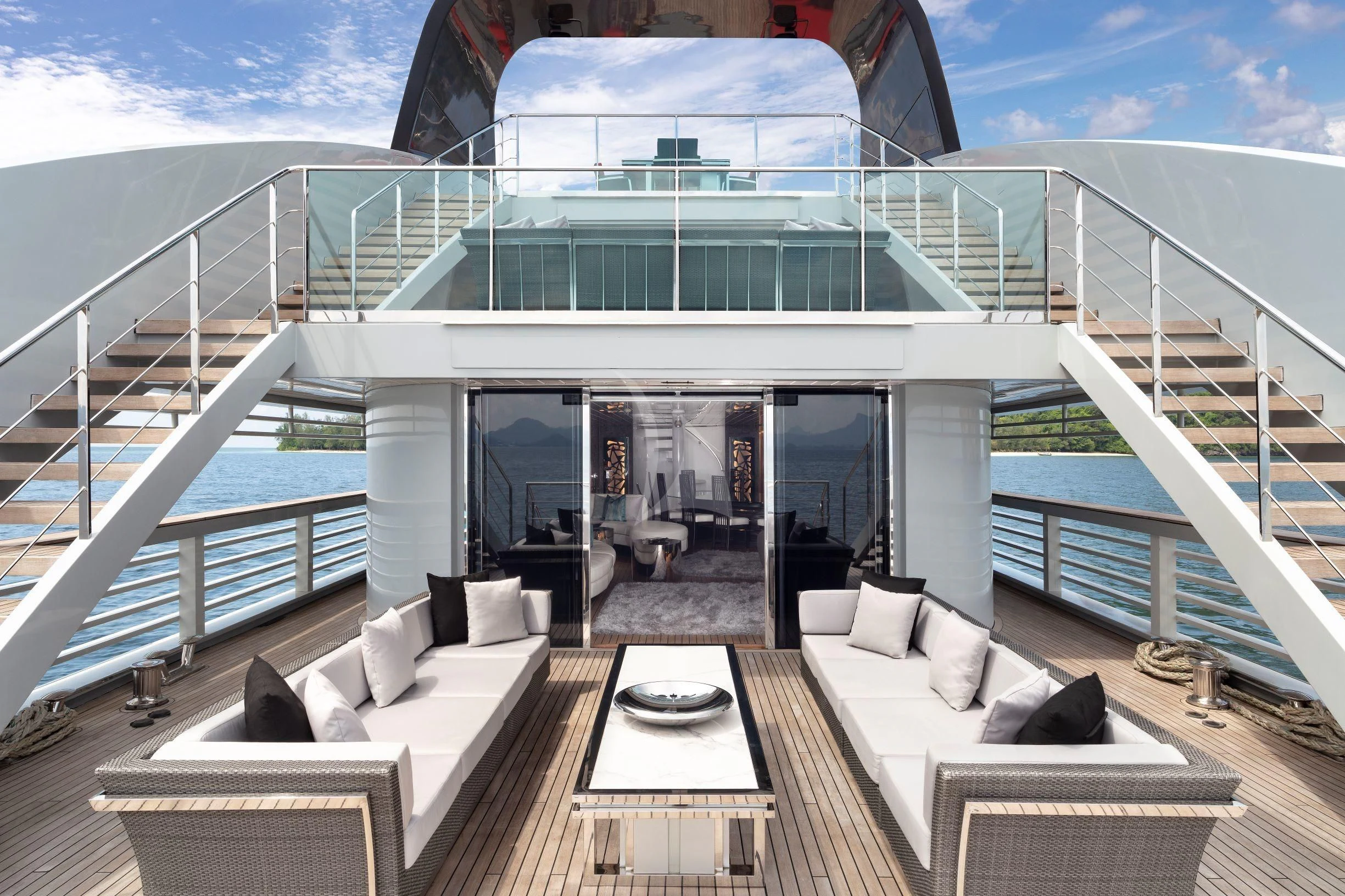 a large white building with a balcony aboard OCEAN EMERALD Yacht for Sale