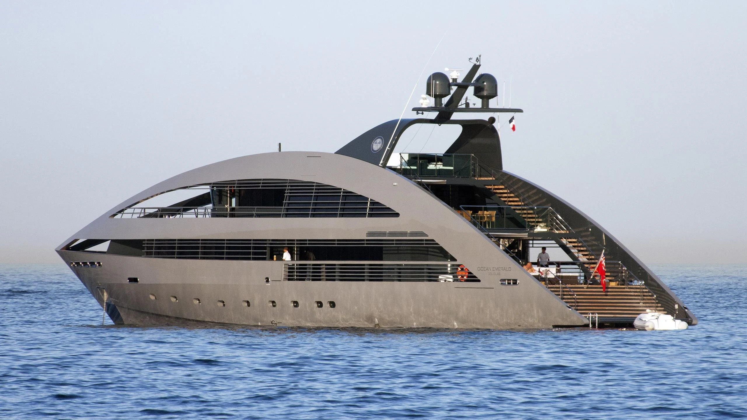 a large boat in the water aboard OCEAN EMERALD Yacht for Sale