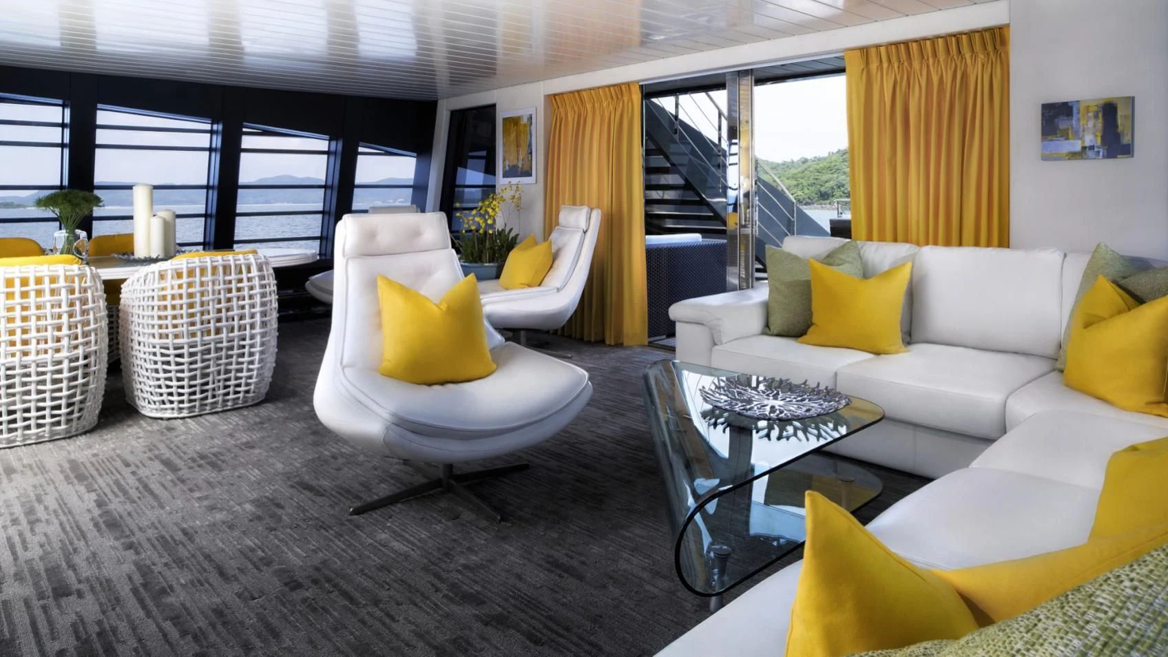 a living room with a large window aboard OCEAN EMERALD Yacht for Sale