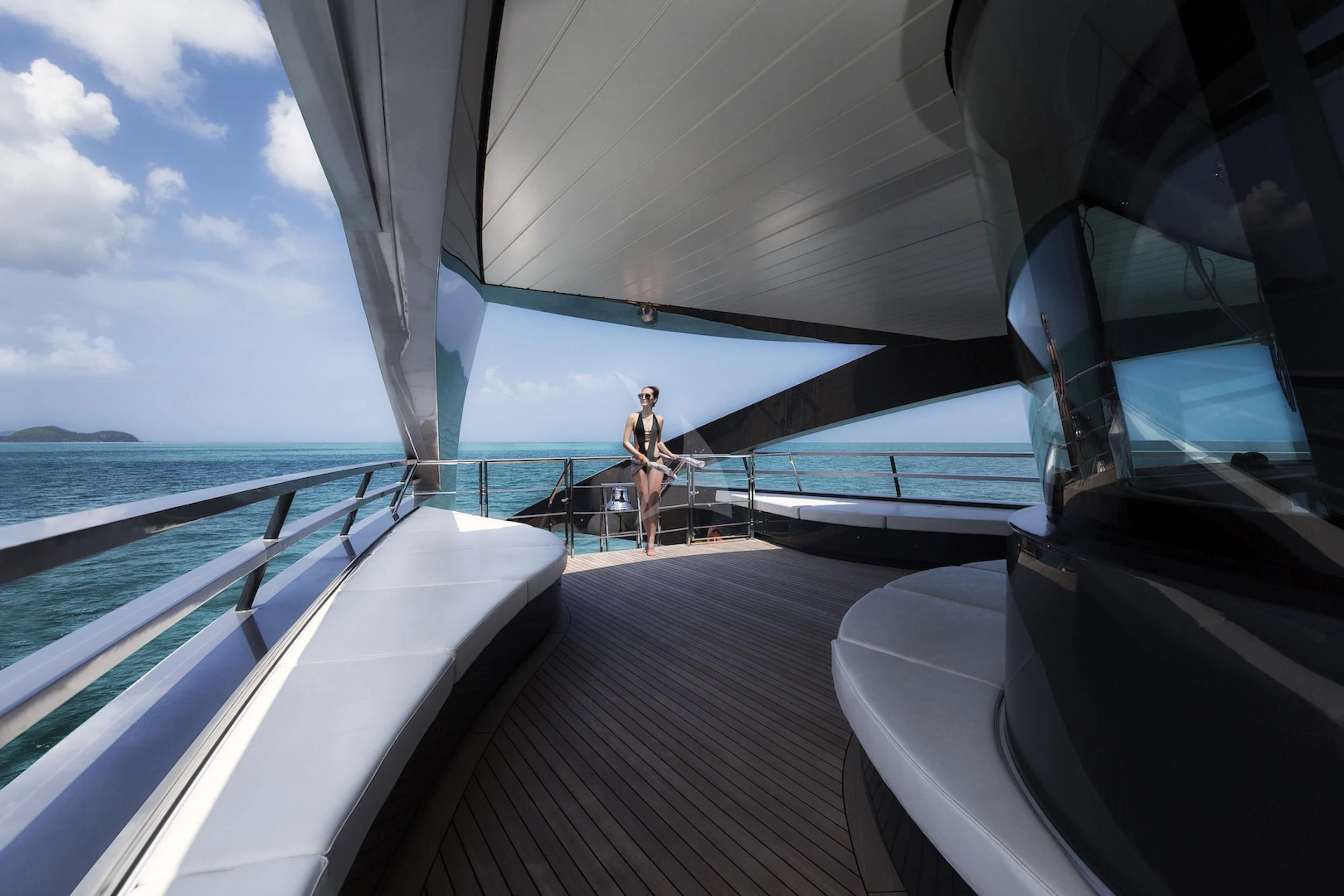 a person standing on a boat aboard OCEAN EMERALD Yacht for Sale