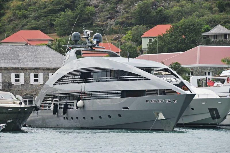 a boat docked at a pier aboard OCEAN EMERALD Yacht for Sale