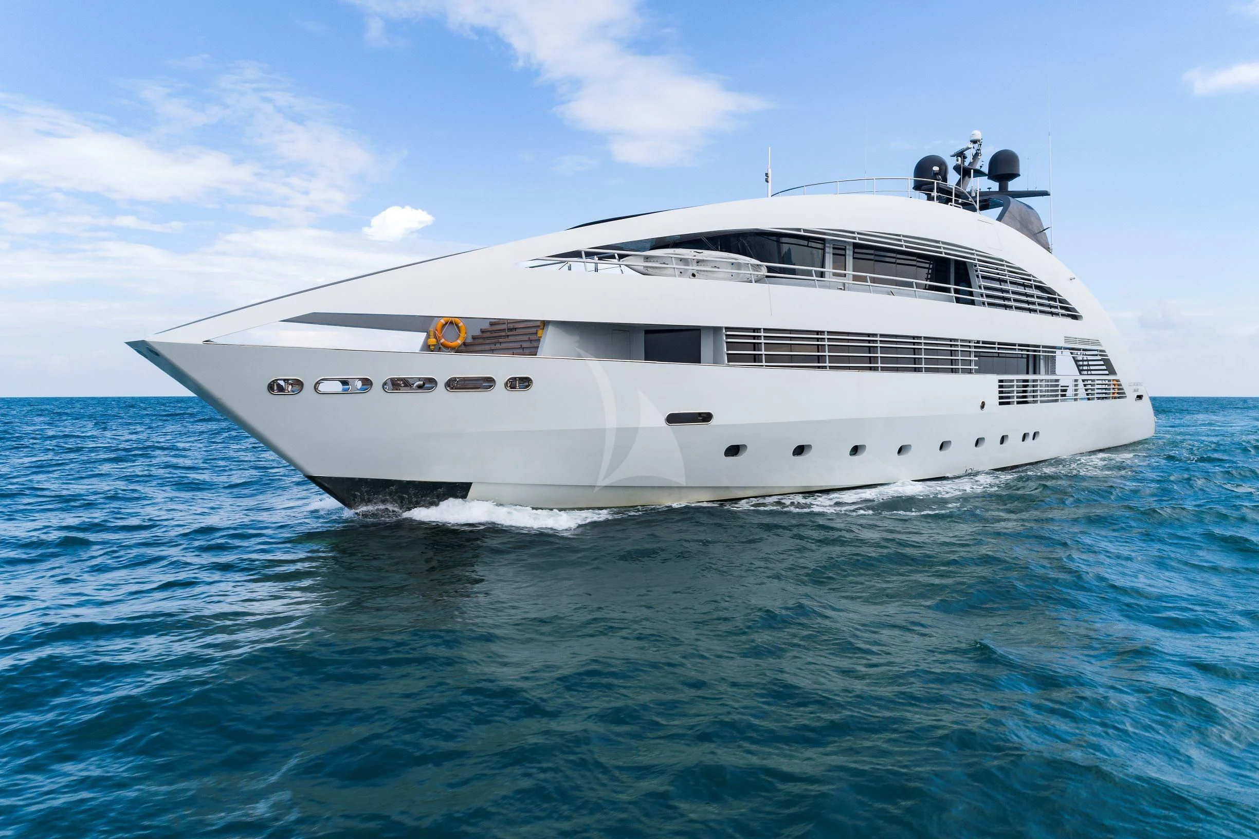a white yacht in the water aboard OCEAN EMERALD Yacht for Sale