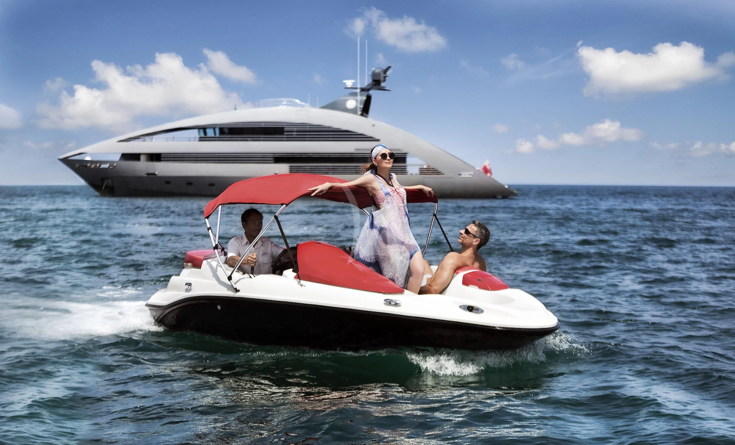 a group of people in a boat in the water aboard OCEAN EMERALD Yacht for Sale