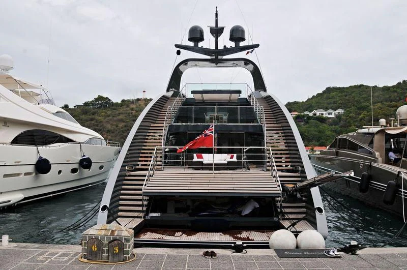 a boat docked at a pier aboard OCEAN EMERALD Yacht for Sale