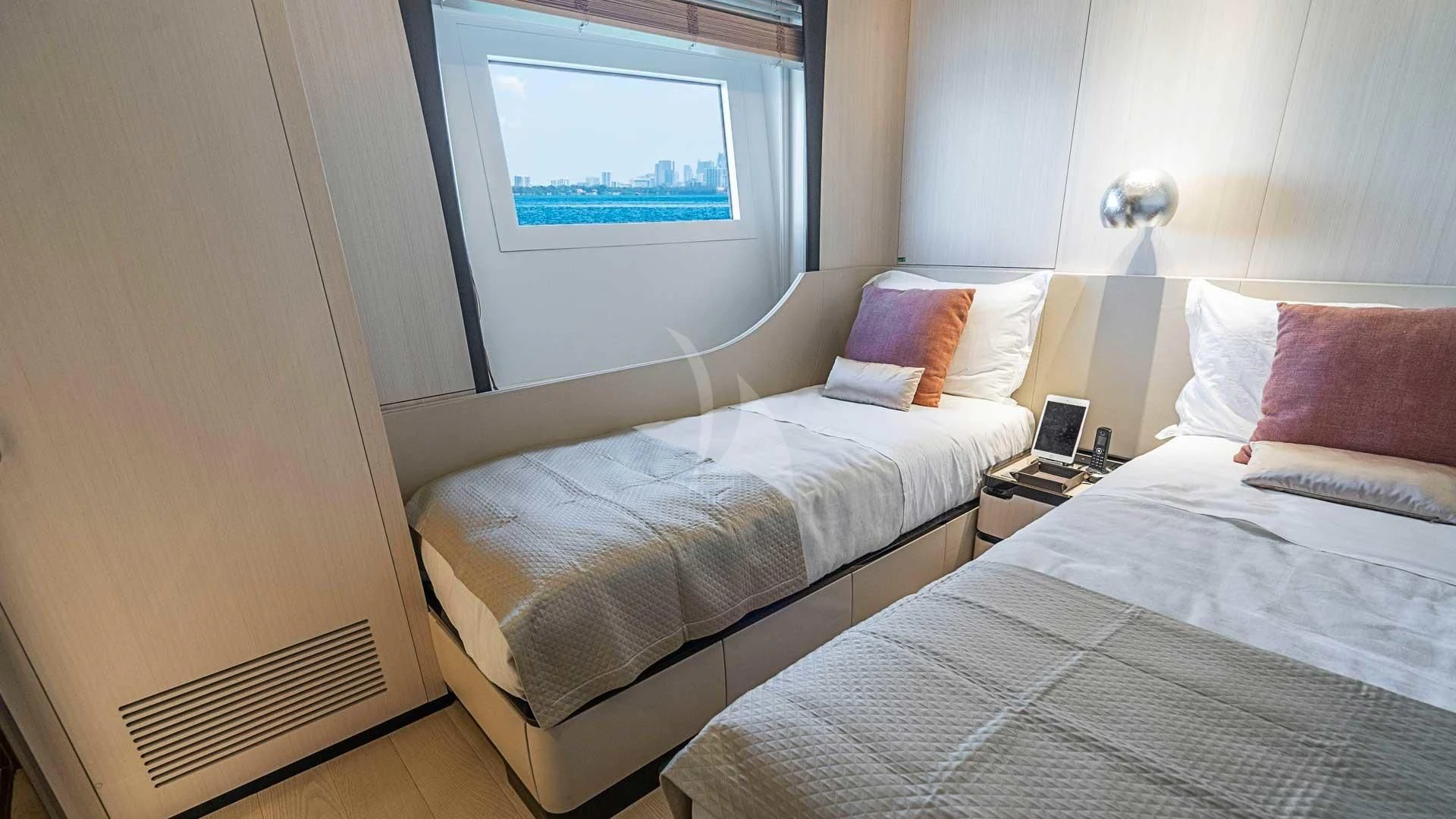 a couple of beds in a room aboard BELLA VITA Yacht for Charter