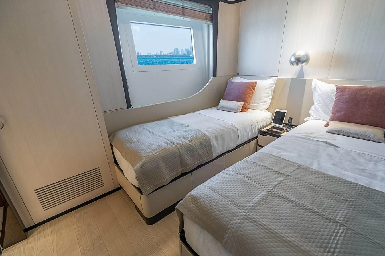 a couple of beds in a room aboard BELLA VITA Yacht for Charter