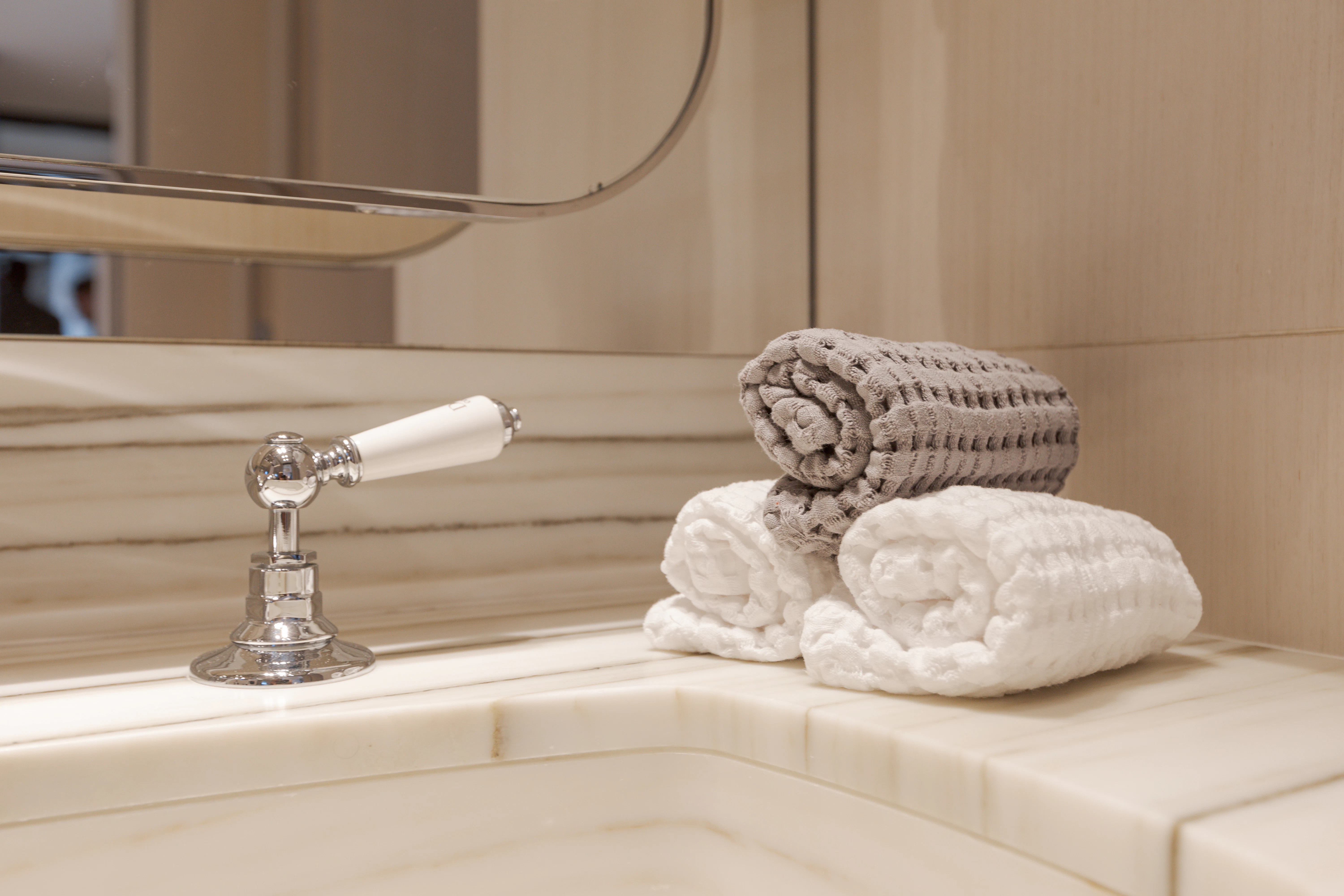 a sink with towels on it aboard BELLA VITA Yacht for Charter