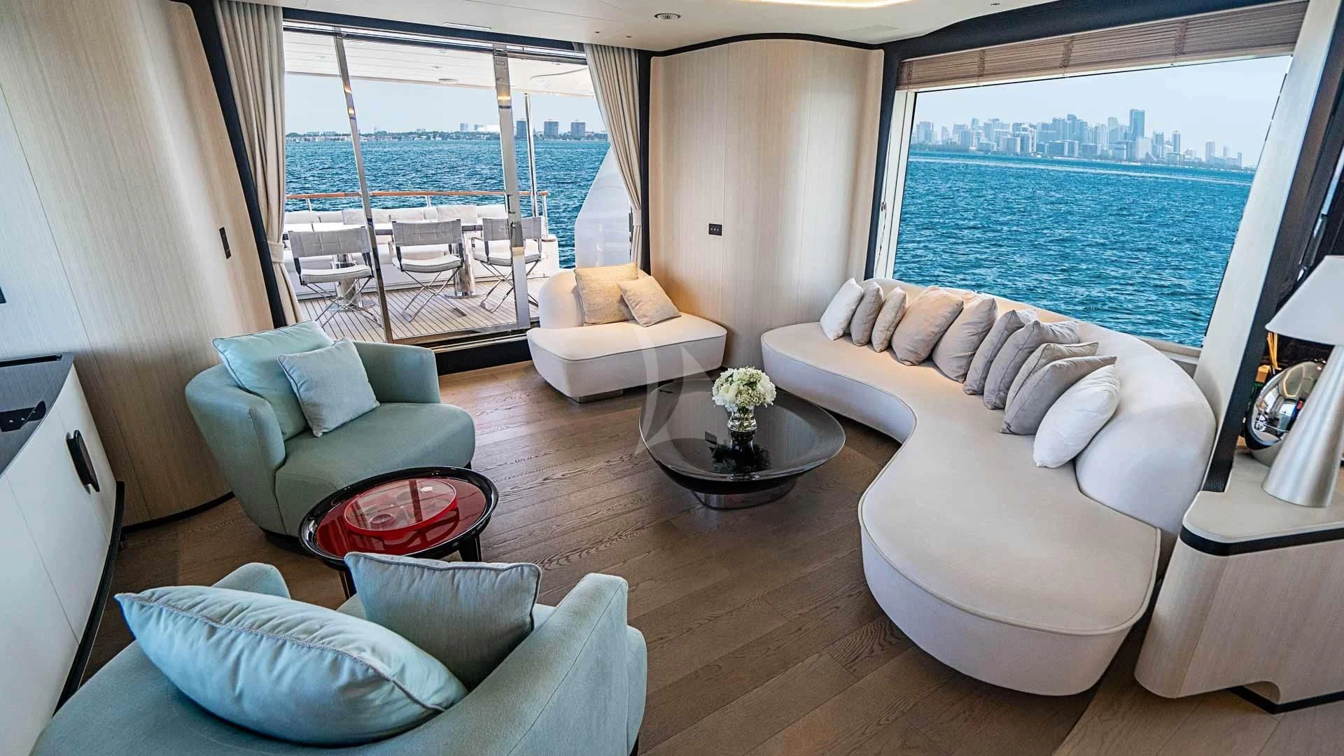 a living room with a large window aboard BELLA VITA Yacht for Charter