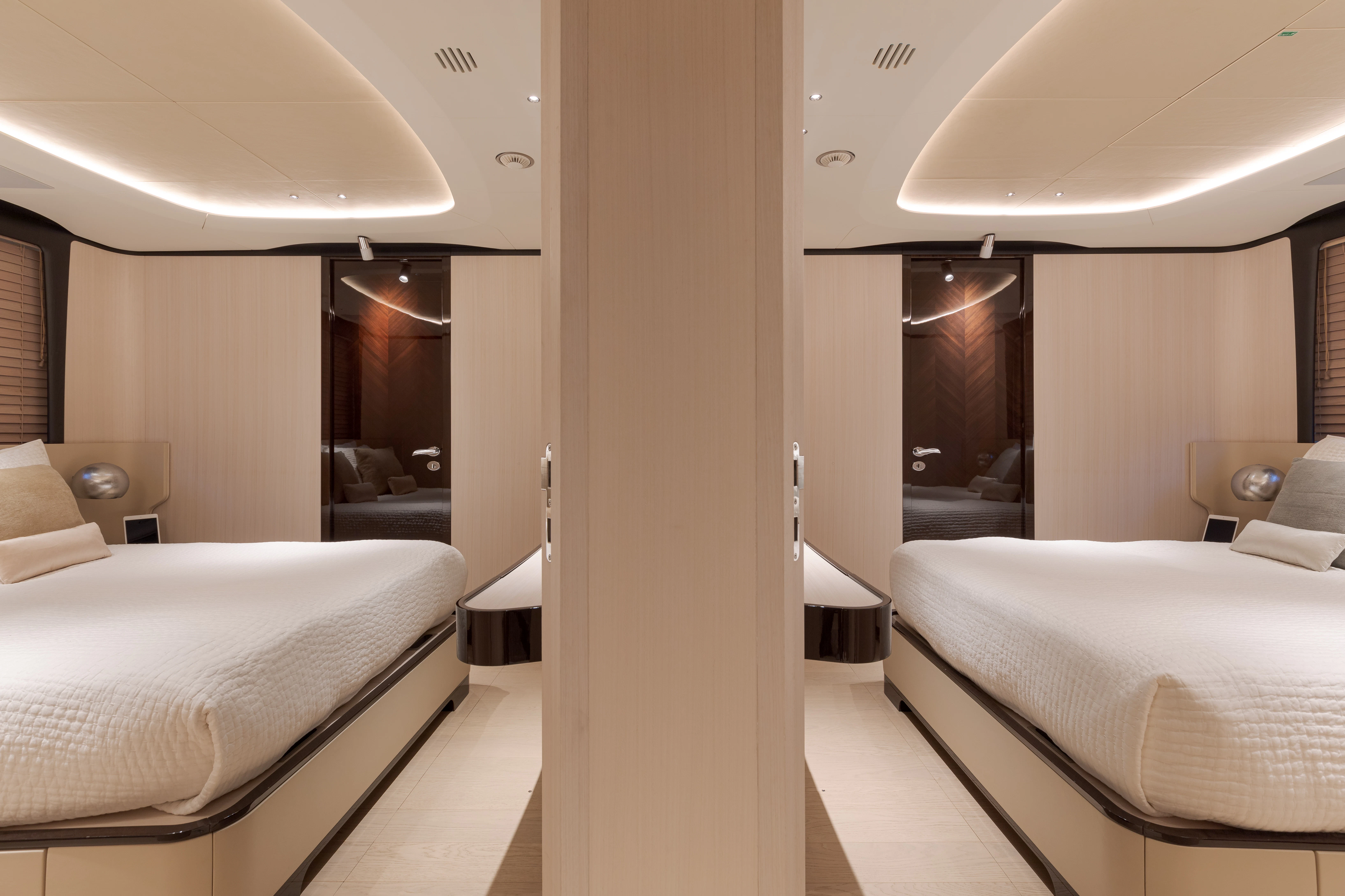 a room with a couple of beds aboard BELLA VITA Yacht for Charter