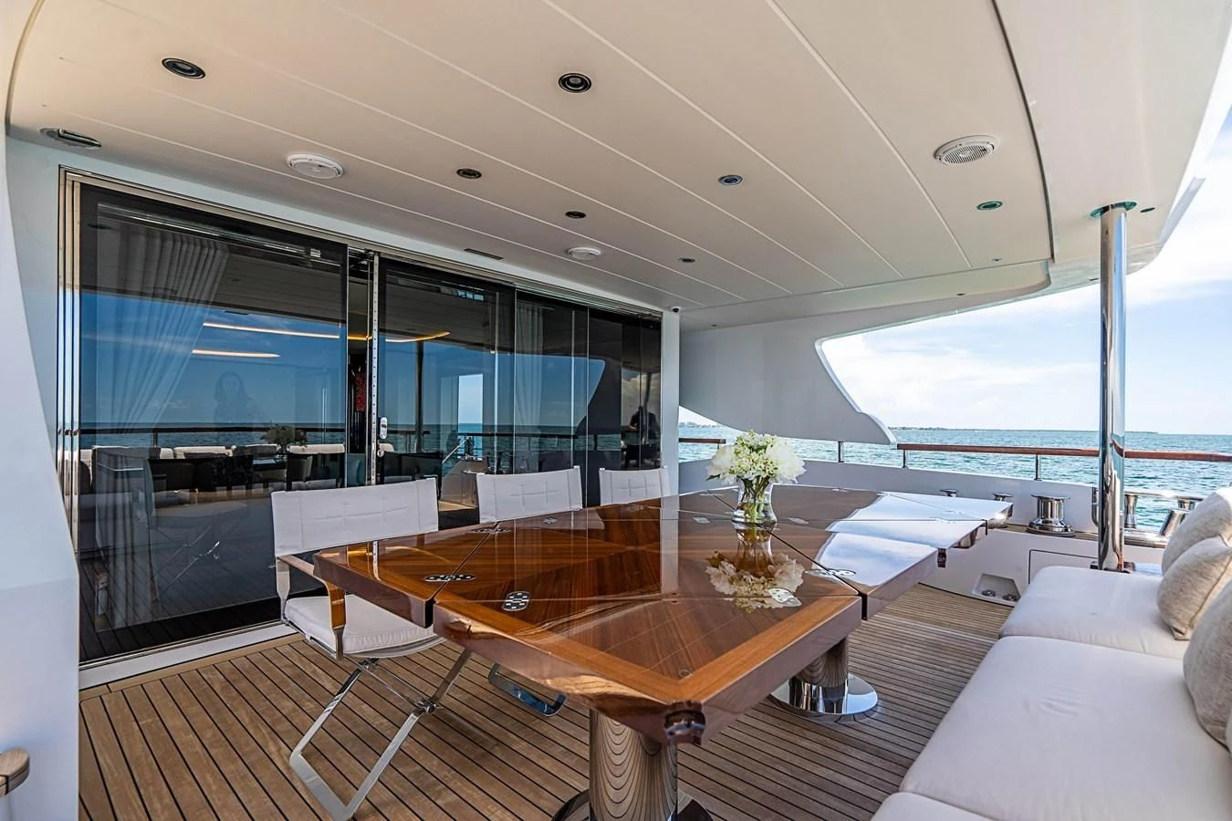a room with a table and chairs aboard BELLA VITA Yacht for Charter