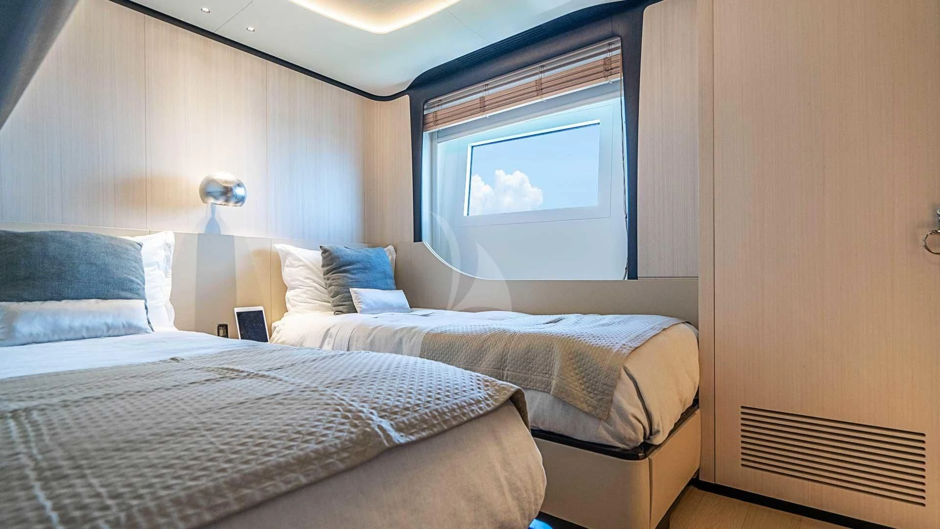 a room with two beds aboard BELLA VITA Yacht for Charter