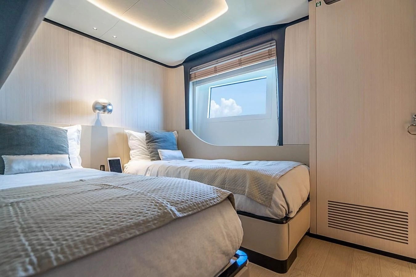 a room with two beds aboard BELLA VITA Yacht for Charter