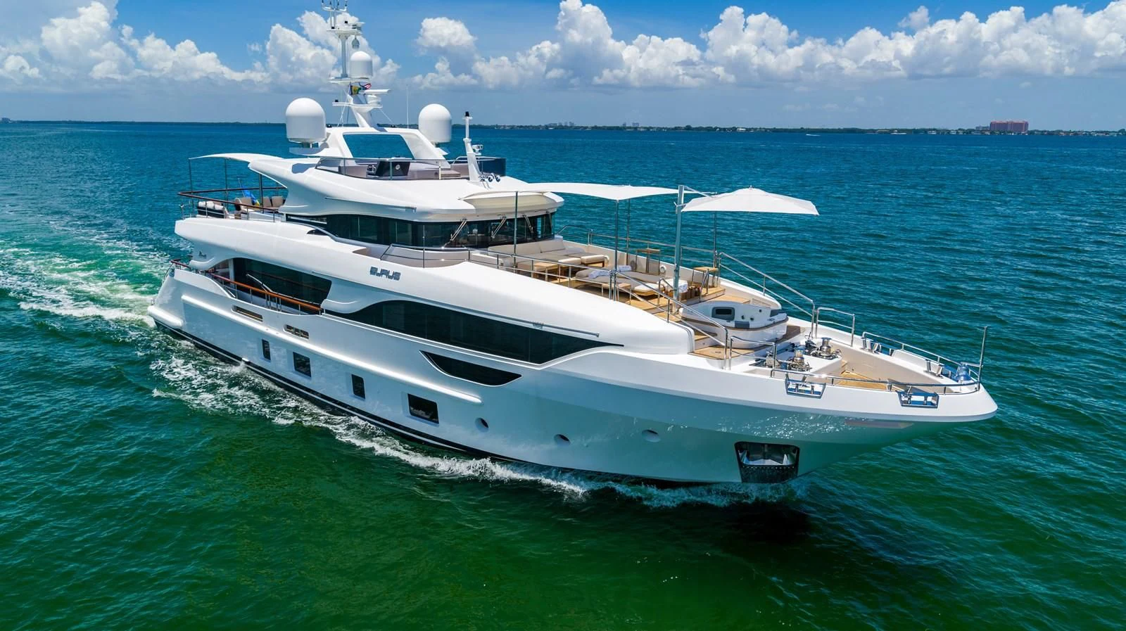 a white yacht in the water aboard BELLA VITA Yacht for Charter