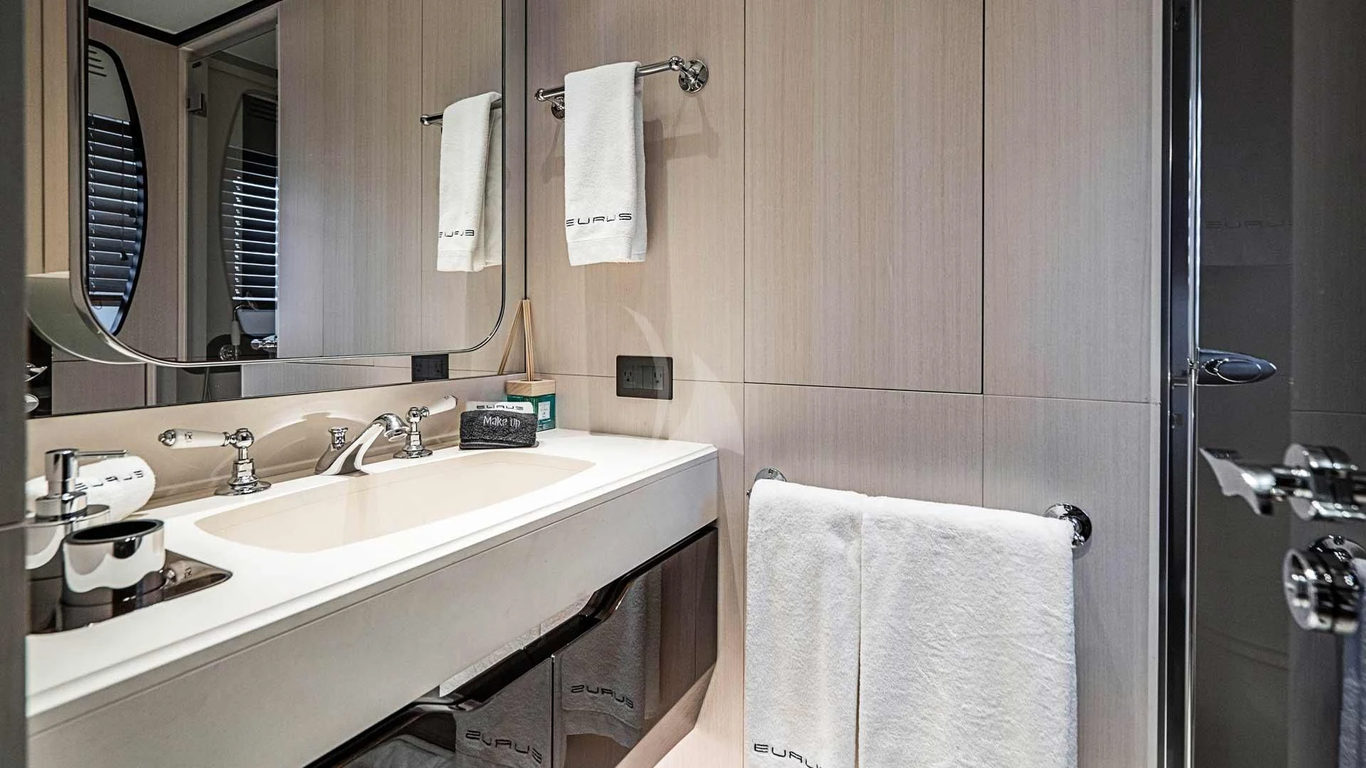 a bathroom with a sink and a mirror aboard BELLA VITA Yacht for Charter